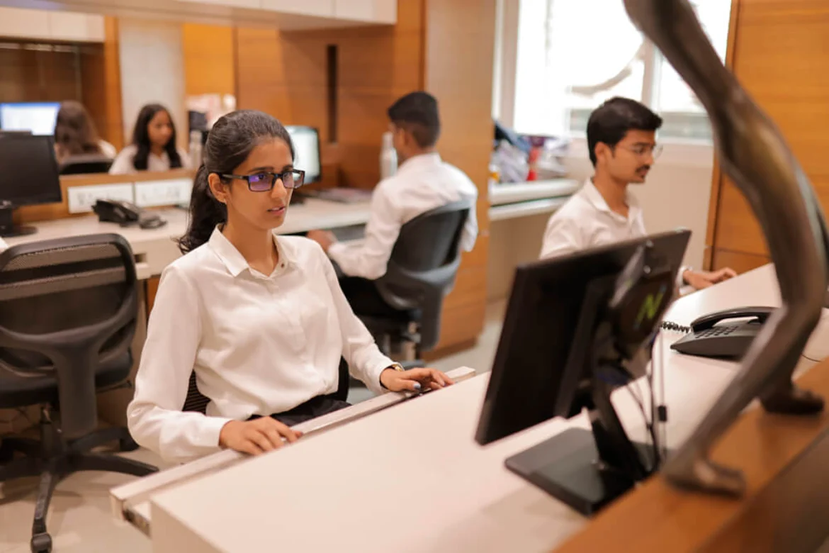 Team members working at the KSM office